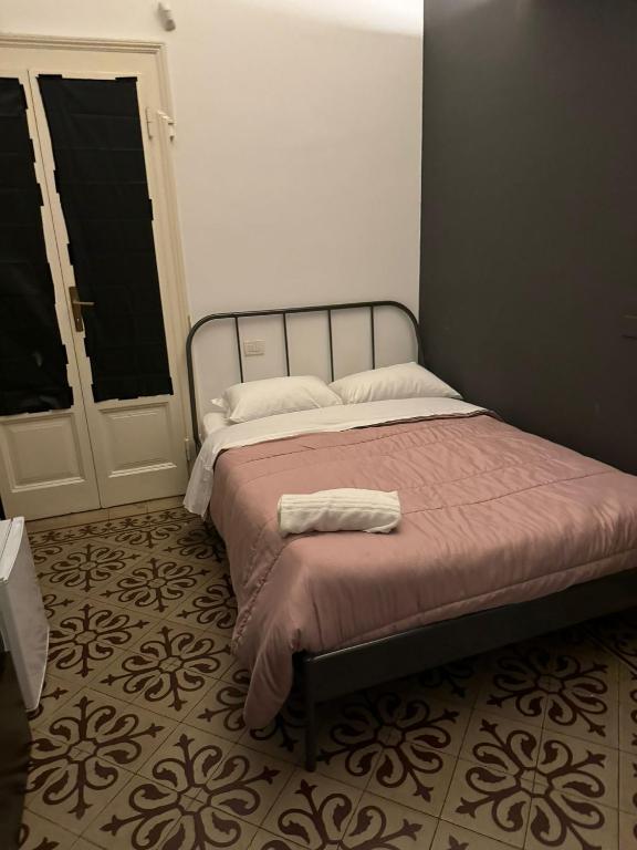 Postel nebo postele na pokoji v ubytování Central Hostel Milano