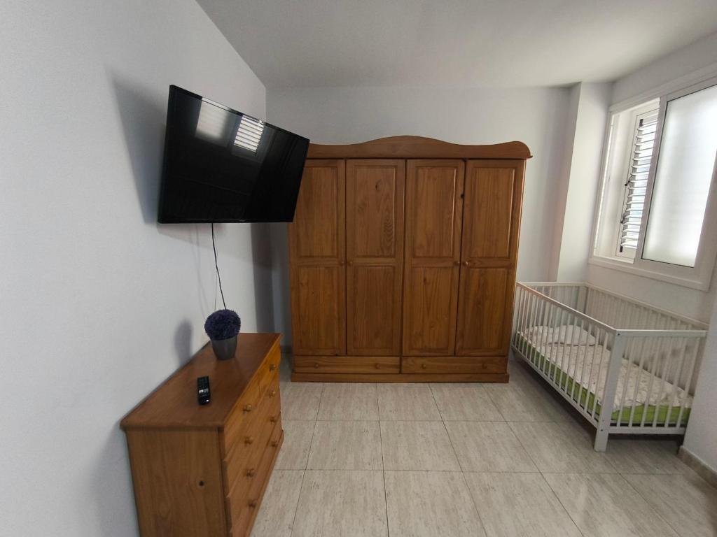 Postel nebo postele na pokoji v ubytování AR Home - Apartamento de 3 dormitorios con ascensor en Las Huesas, Telde