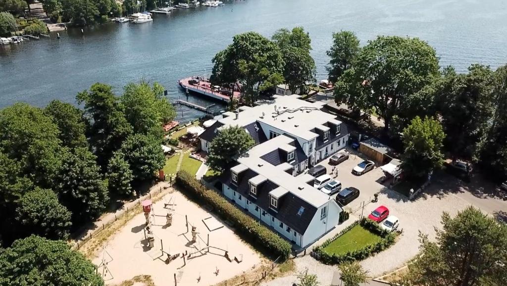 an aerial view of an rv park next to a river at Hotel Himmel und Havel in Berlin