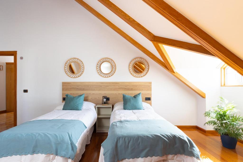 Postel nebo postele na pokoji v ubytování Casa Lali Habitación baño compartido