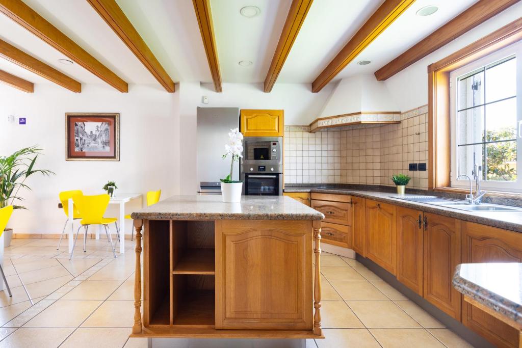 Kuchyň nebo kuchyňský kout v ubytování Casa Lali Habitación baño compartido