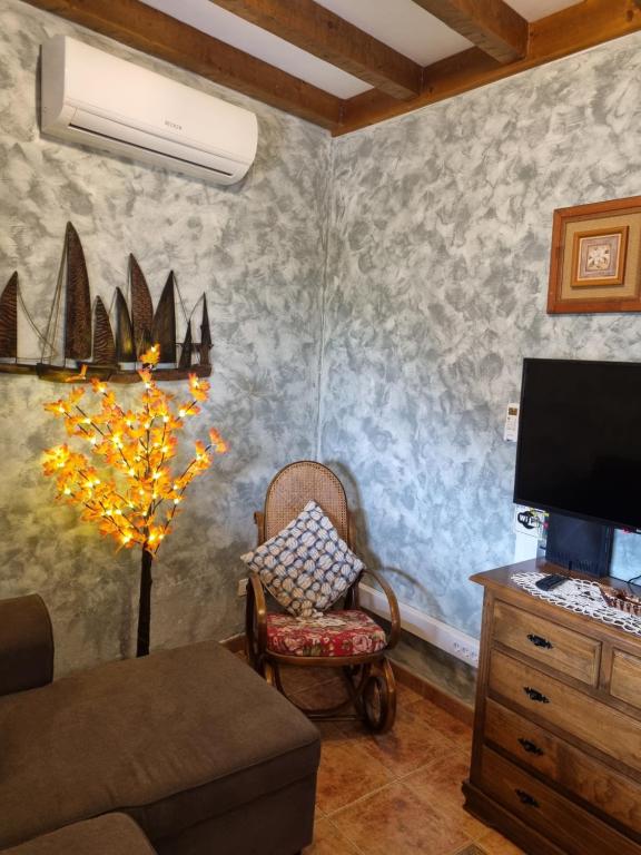 TV a/nebo společenská místnost v ubytování CASA PABLITO