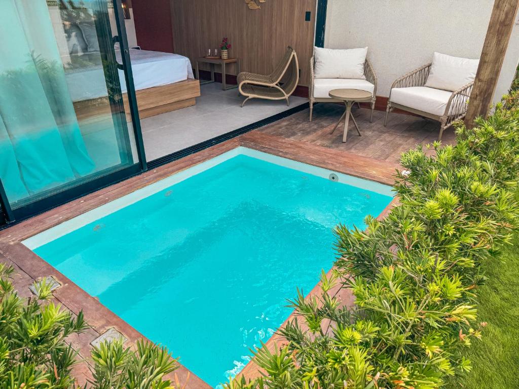 Bazén v ubytování Poozendin Hotel de Charme nebo v jeho okolí
