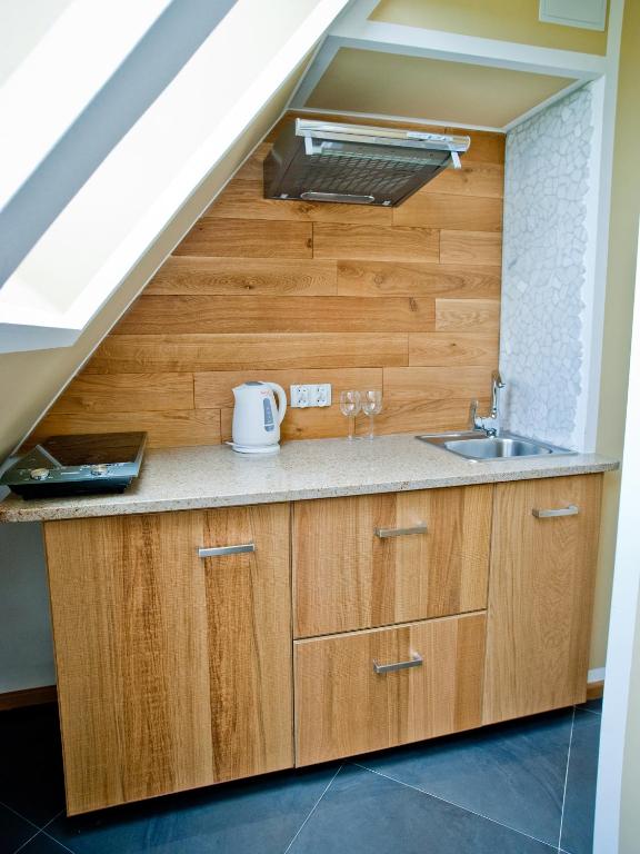 Kuchyňa alebo kuchynka v ubytovaní Apartamenty Toporowa Cyrhla
