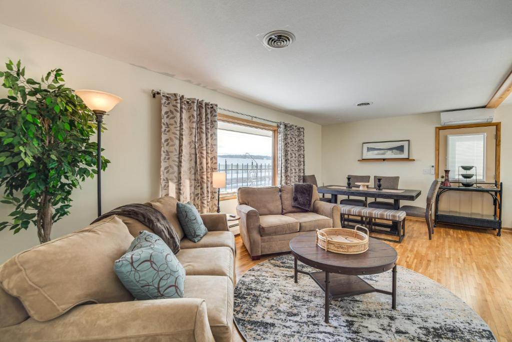 a living room with a couch and a table at Walk to Lake Beach Glenwood Vacation Rental! in Glenwood