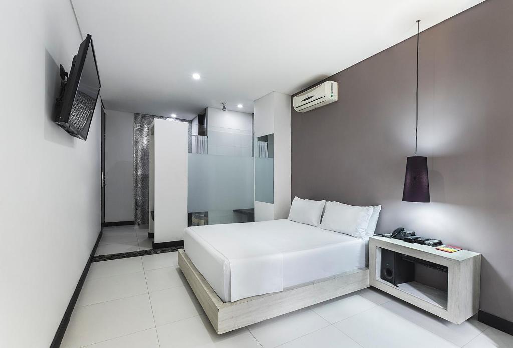 TV a/nebo společenská místnost v ubytování Hotel 47 Medellin Center