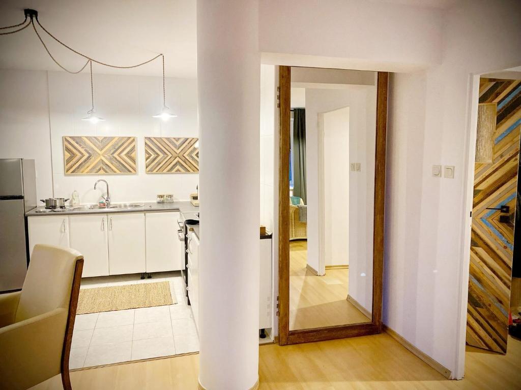 Ένα μπάνιο στο Mozaika Art Apartment PL LT EN