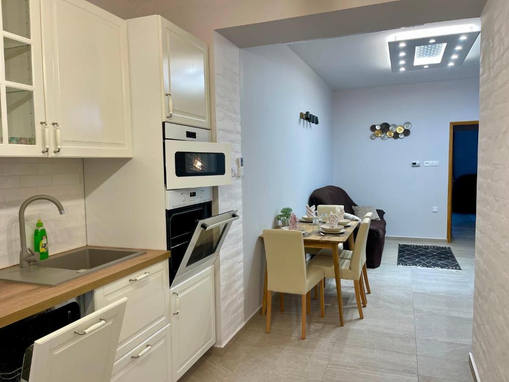 Kuchyň nebo kuchyňský kout v ubytování Vitality Apartman