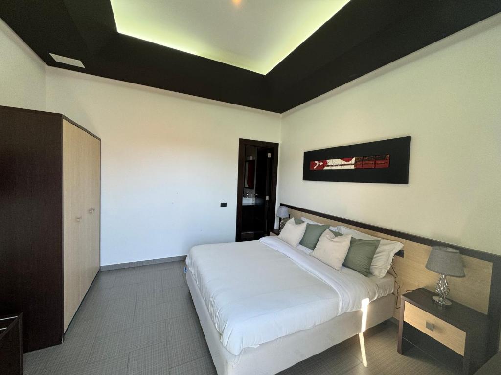 Postel nebo postele na pokoji v ubytování Boteco B&B