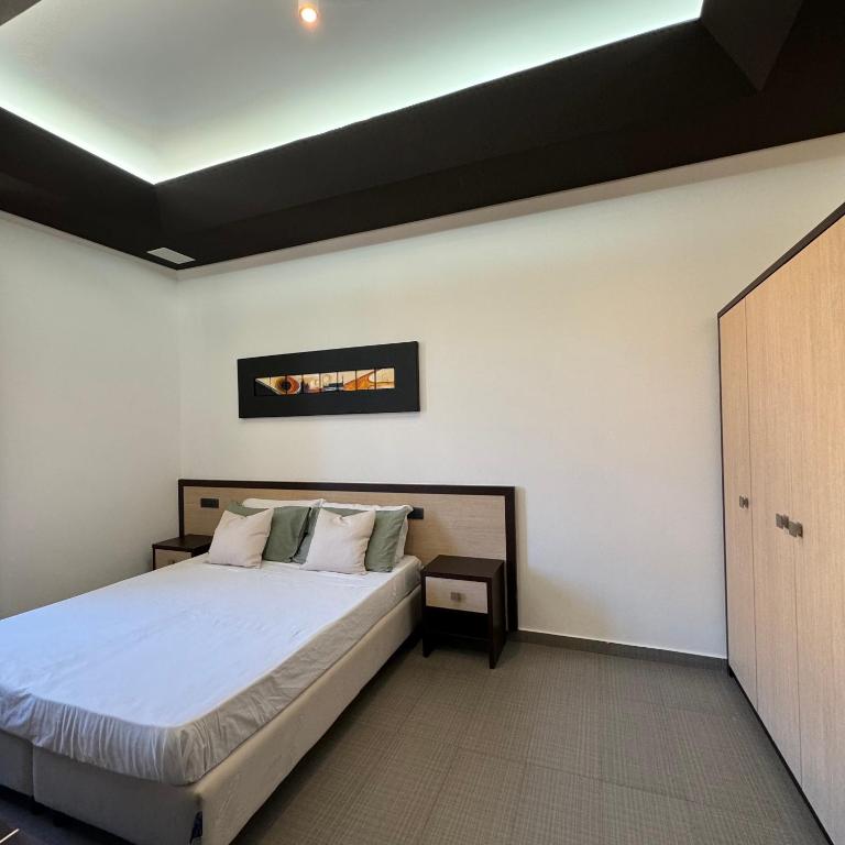Postel nebo postele na pokoji v ubytování Boteco B&B