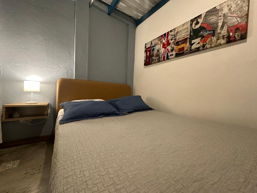 Postel nebo postele na pokoji v ubytování Hotel Casa Lucca