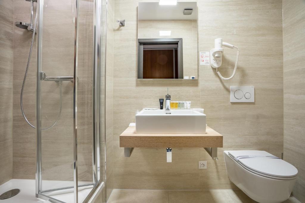 Koupelna v ubytování Hotel Šumava