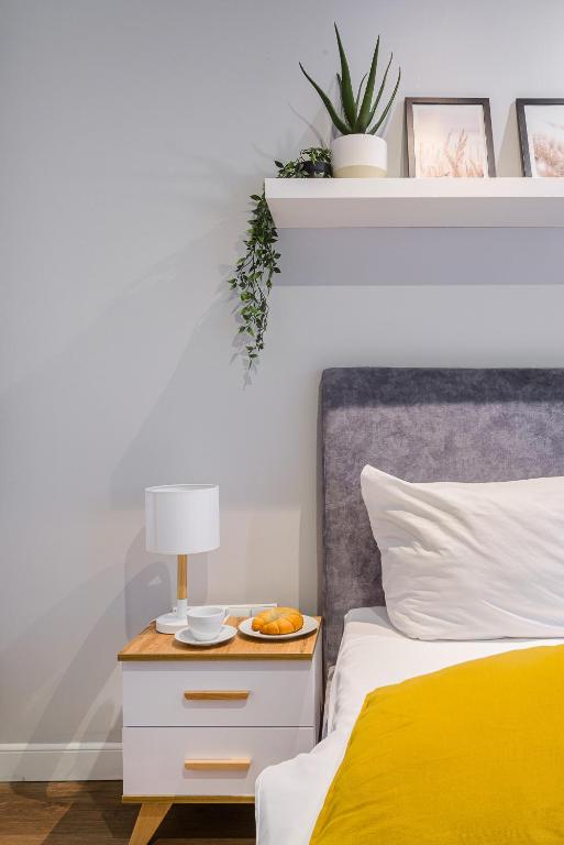 Posteľ alebo postele v izbe v ubytovaní Browary Warszawskie P&O Serviced Apartments