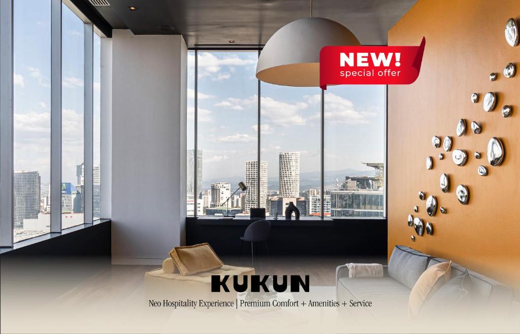 a living room with a view of a city at Kukun Collection in Mexico City