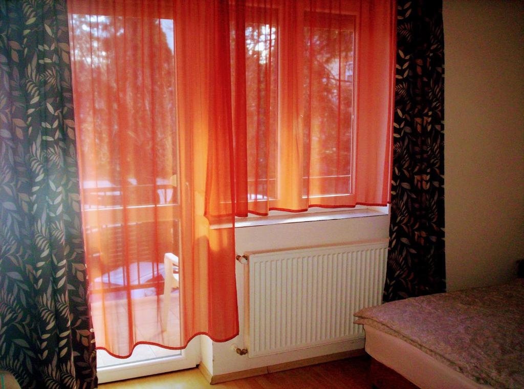 Posteľ alebo postele v izbe v ubytovaní HAUS FERENCZ Bötös Villa