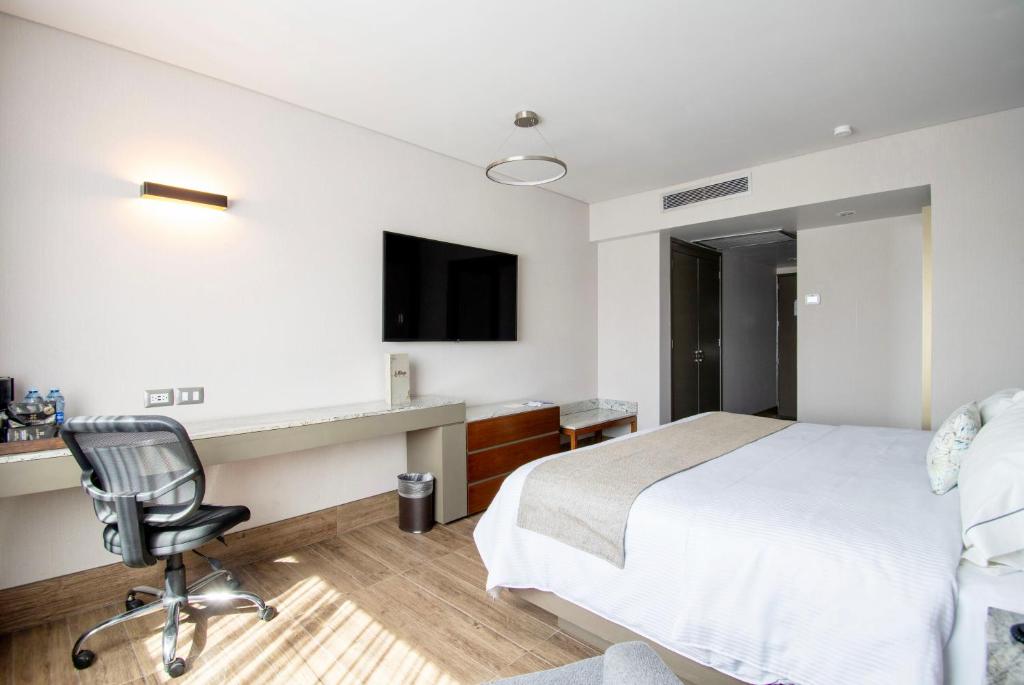 TV a/nebo společenská místnost v ubytování Hotel Plaza Diana