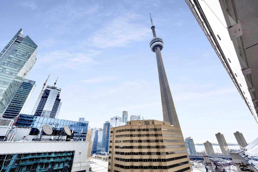 a view of the cn tower in a city at Deluxe CN Tower View FreeParking PrimeDT Location F1 in Toronto