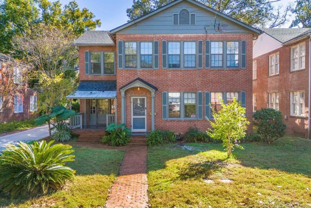 a large brick house with a blue door at Best Location In San Marco! Walkable shopping&fun! in Jacksonville