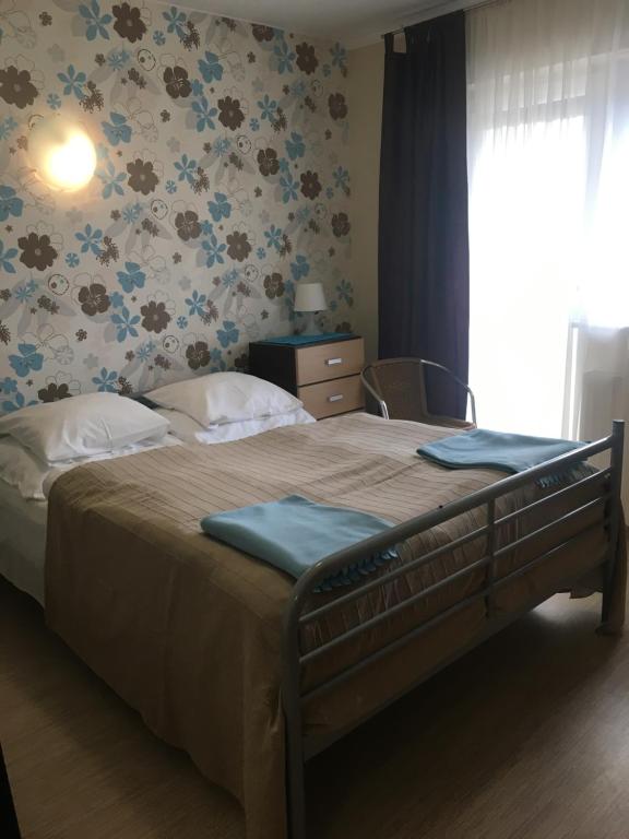Postel nebo postele na pokoji v ubytování PATIO dom gościnny