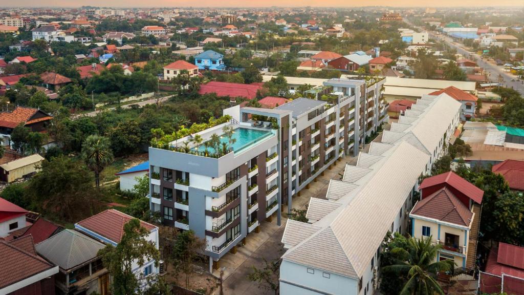 an aerial view of a building in a city at Sky Park Condotel & Residence in Siem Reap