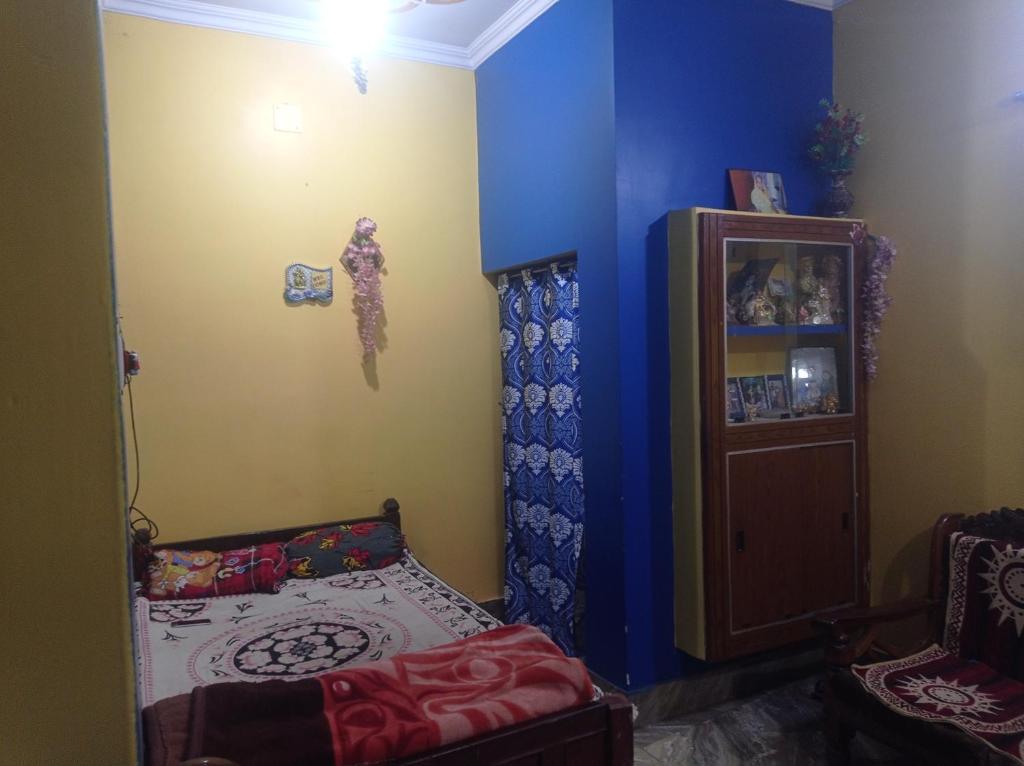 Giường trong phòng chung tại Sumit home stay