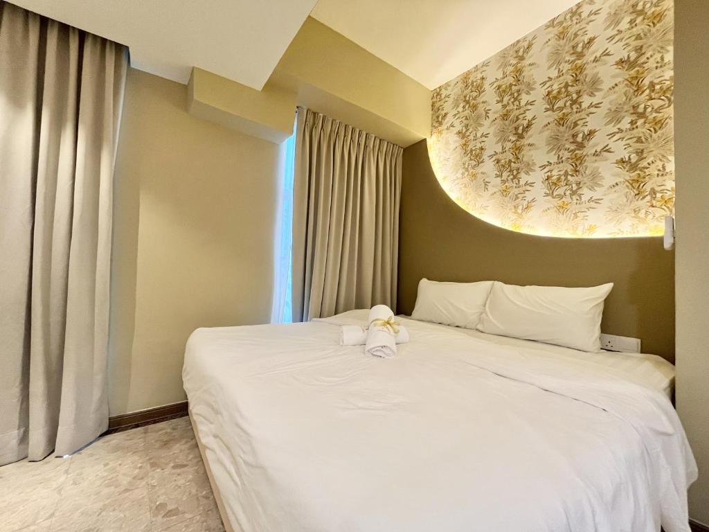 Postel nebo postele na pokoji v ubytování Asimmy Hotel
