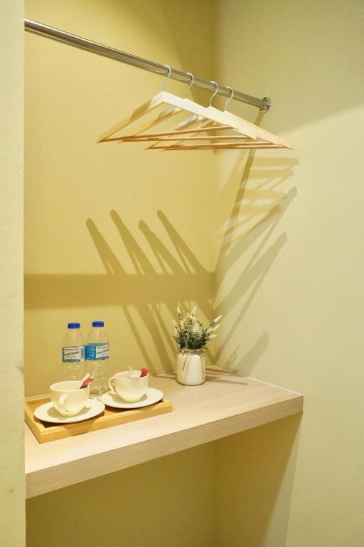 Příslušenství pro přípravu čaje a kávy v ubytování Asimmy Hotel