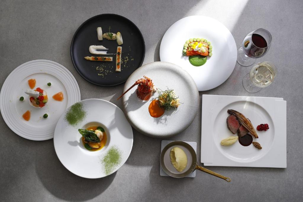 a group of plates of food on a table at Tokyo Marriott Hotel in Tokyo