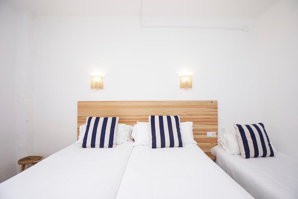 Posteľ alebo postele v izbe v ubytovaní Hotel Casa Mas
