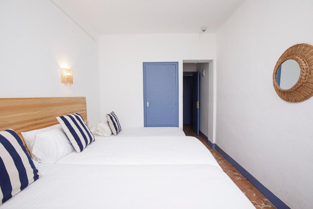 Posteľ alebo postele v izbe v ubytovaní Hotel Casa Mas