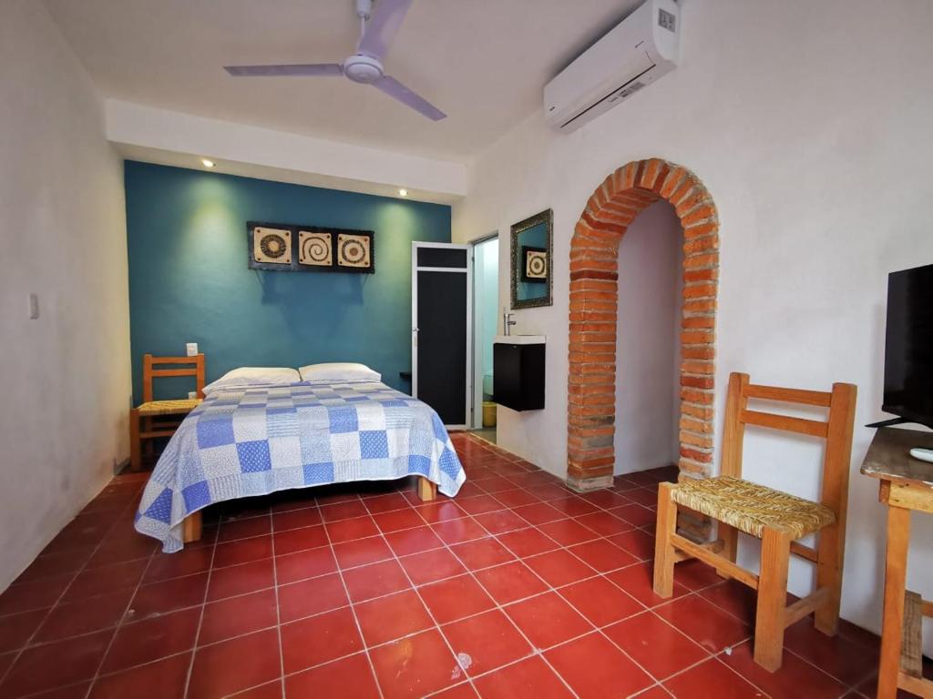 Postel nebo postele na pokoji v ubytování Casa Rey Sol Vallarta