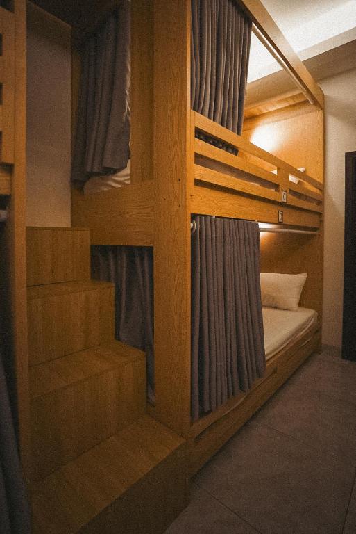 Postel nebo postele na pokoji v ubytování The One Hostel Hanoi