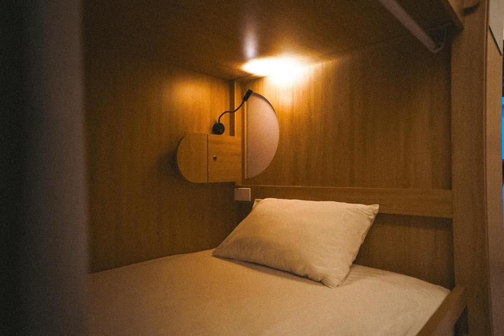 Postel nebo postele na pokoji v ubytování The One Hostel Hanoi