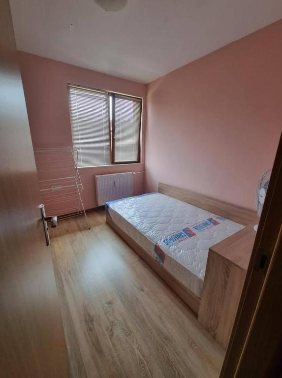 Postel nebo postele na pokoji v ubytování Апартамент Плевен