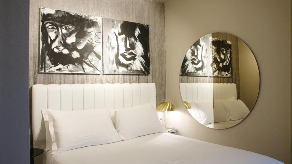 Postel nebo postele na pokoji v ubytování Hotel Battisti 31