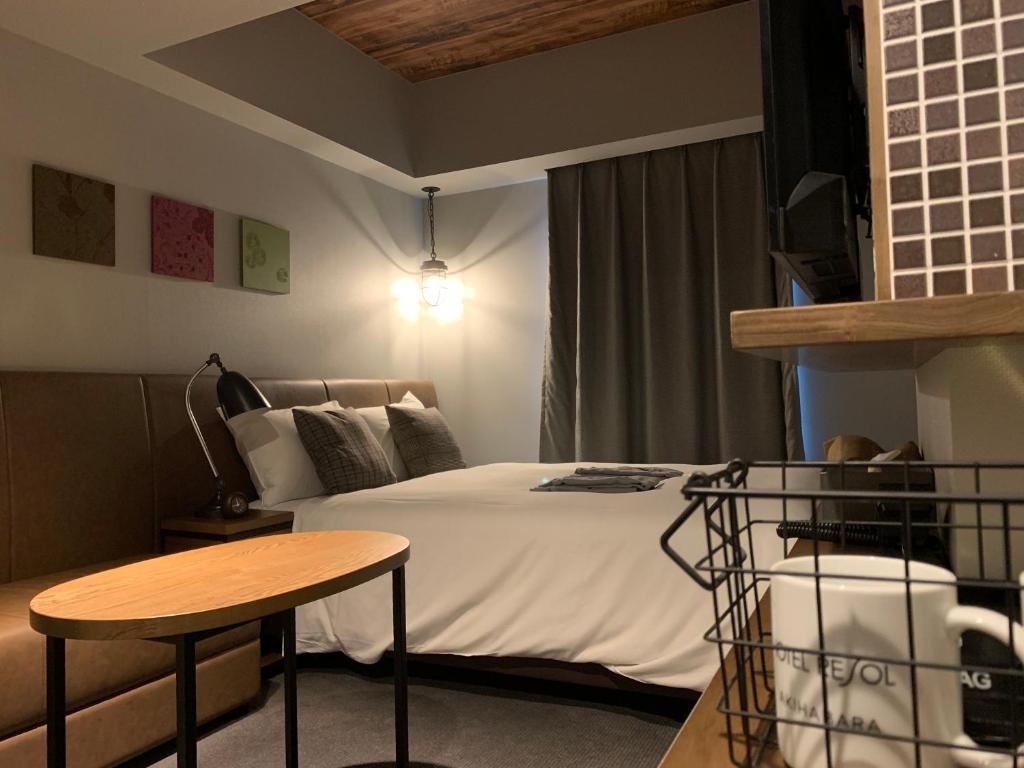 Postel nebo postele na pokoji v ubytování Hotel Resol Akihabara