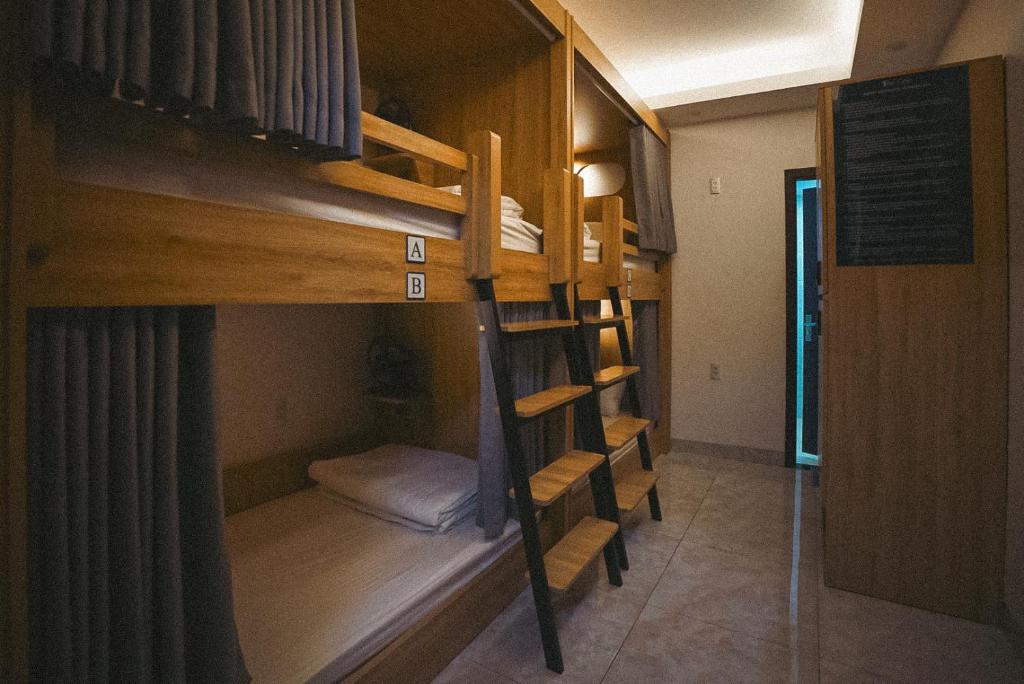 Postel nebo postele na pokoji v ubytování The One Hostel Hanoi