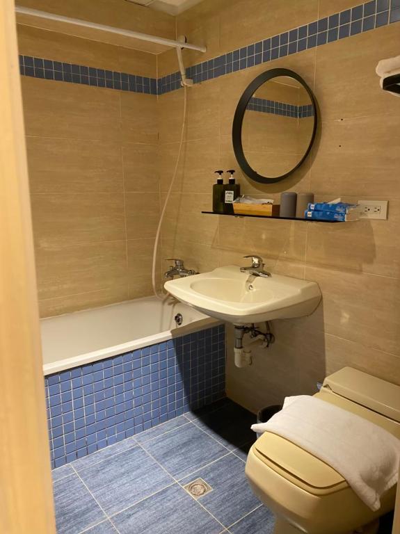 Koupelna v ubytování Meworld Hotel - Zhongshan