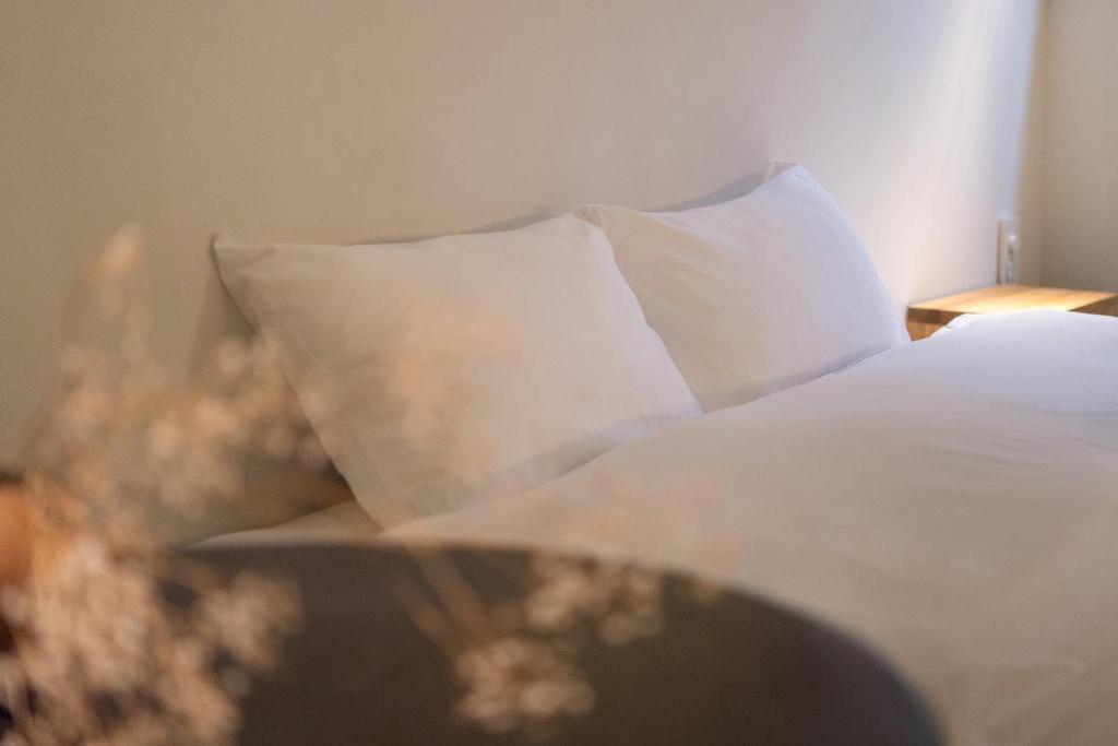 Postel nebo postele na pokoji v ubytování Design Hotel Kyoto Fuyacho