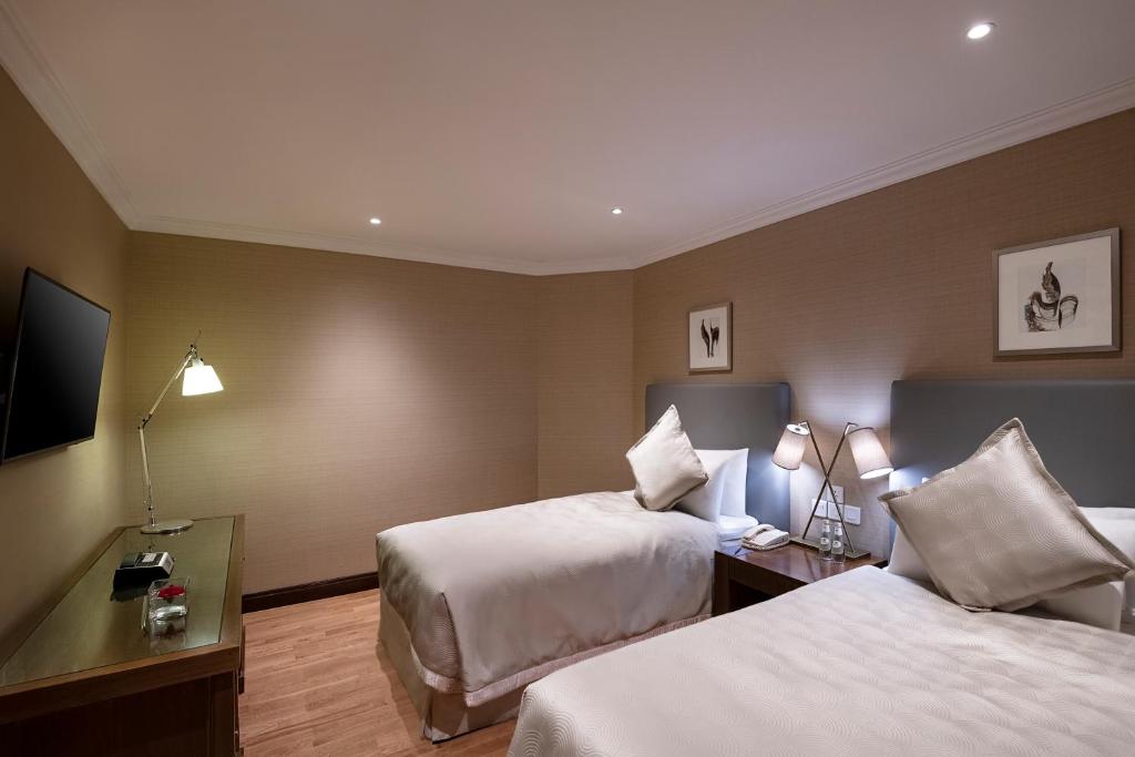 The Oberoi Madina المدينة أوبروي tesisinde bir odada yatak veya yataklar