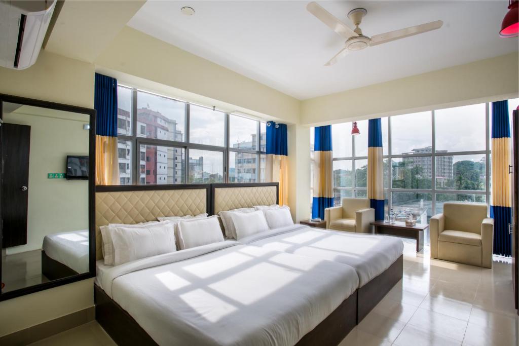 Katil atau katil-katil dalam bilik di New Hotel Grand View
