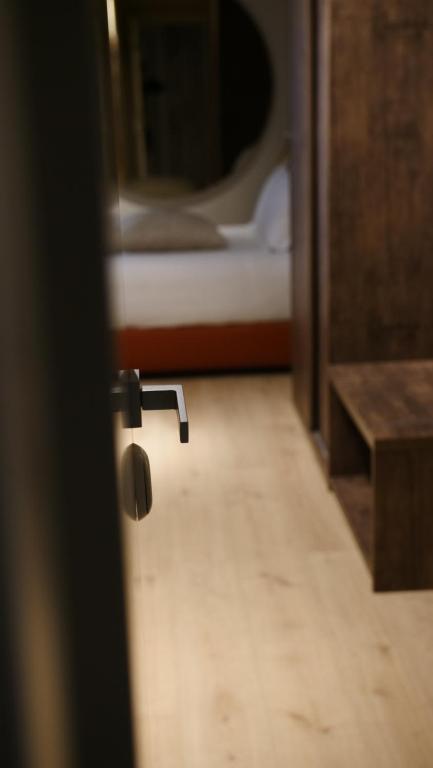 Postel nebo postele na pokoji v ubytování Hotel Battisti 31