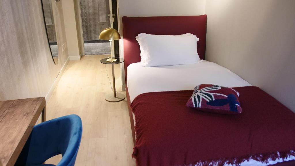Postel nebo postele na pokoji v ubytování Hotel Battisti 31