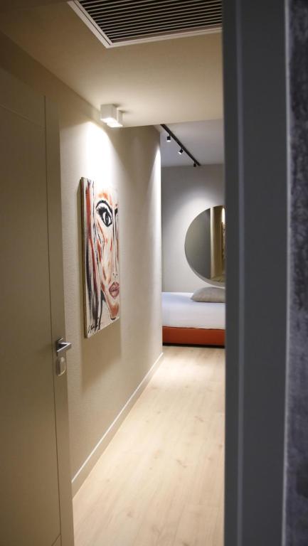 Postel nebo postele na pokoji v ubytování Hotel Battisti 31
