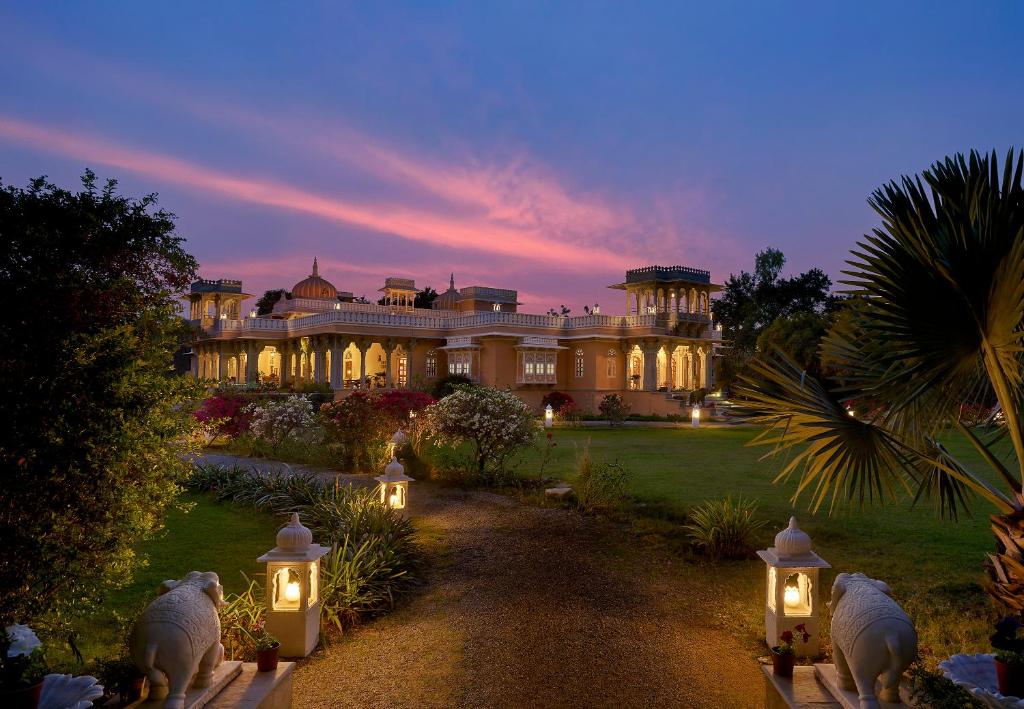 a large house with lights in front of it at Dev Shree Deogarh in Devgarh