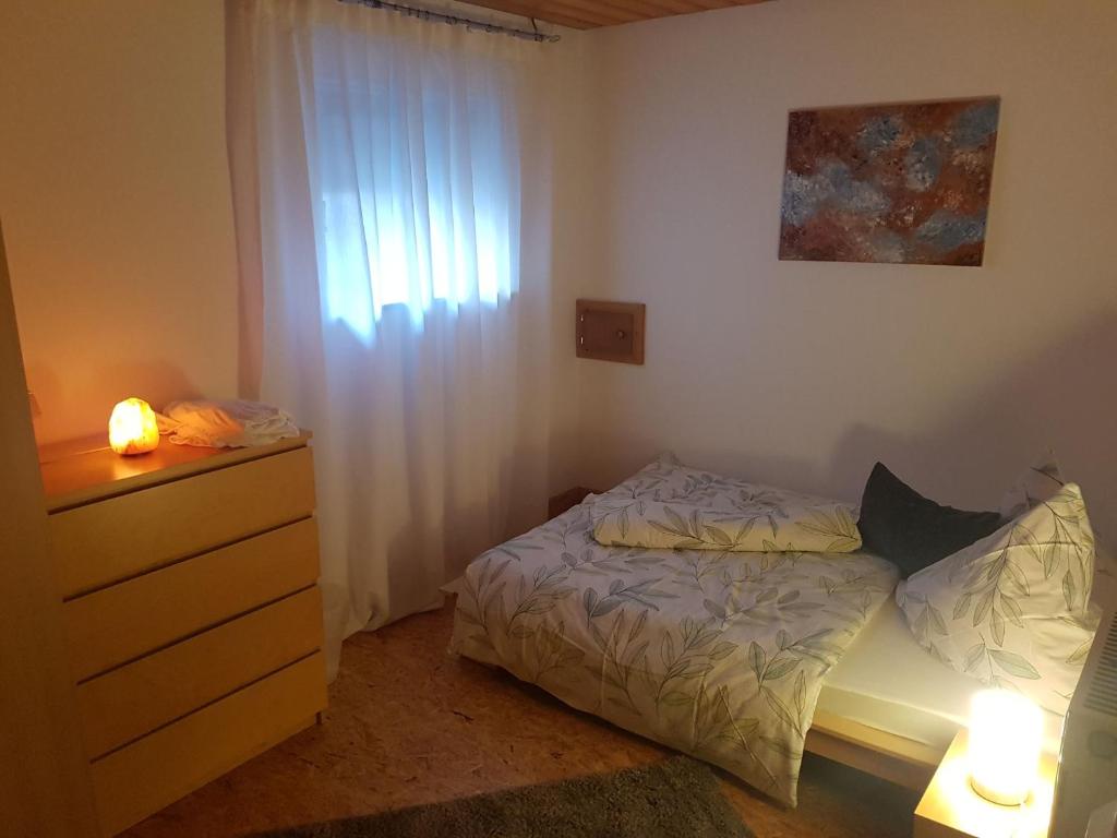 Postel nebo postele na pokoji v ubytování Ferienwohnung Reblaus