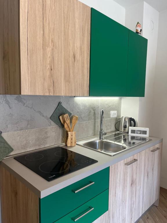 Kuchyň nebo kuchyňský kout v ubytování Borgo Bliss Apartment