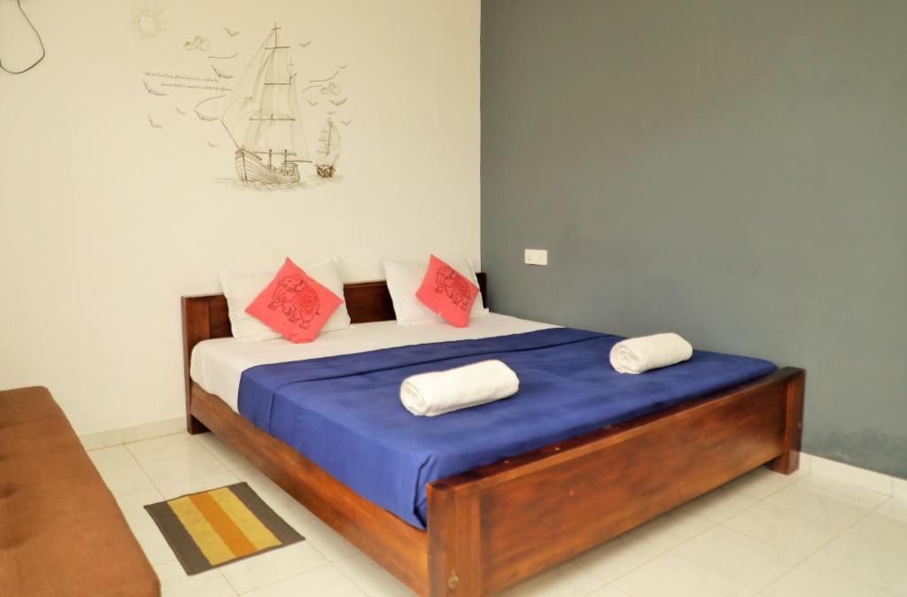 Postel nebo postele na pokoji v ubytování Andorra Tourist Resort Anuradhapura