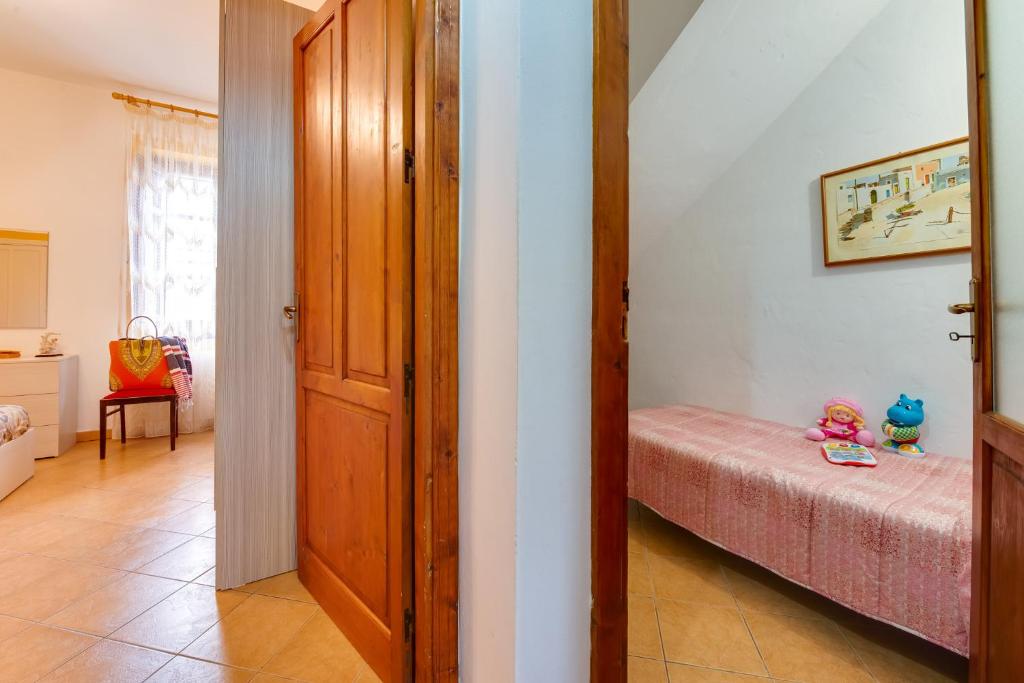 Postel nebo postele na pokoji v ubytování Case Vacanze Castellana Dream