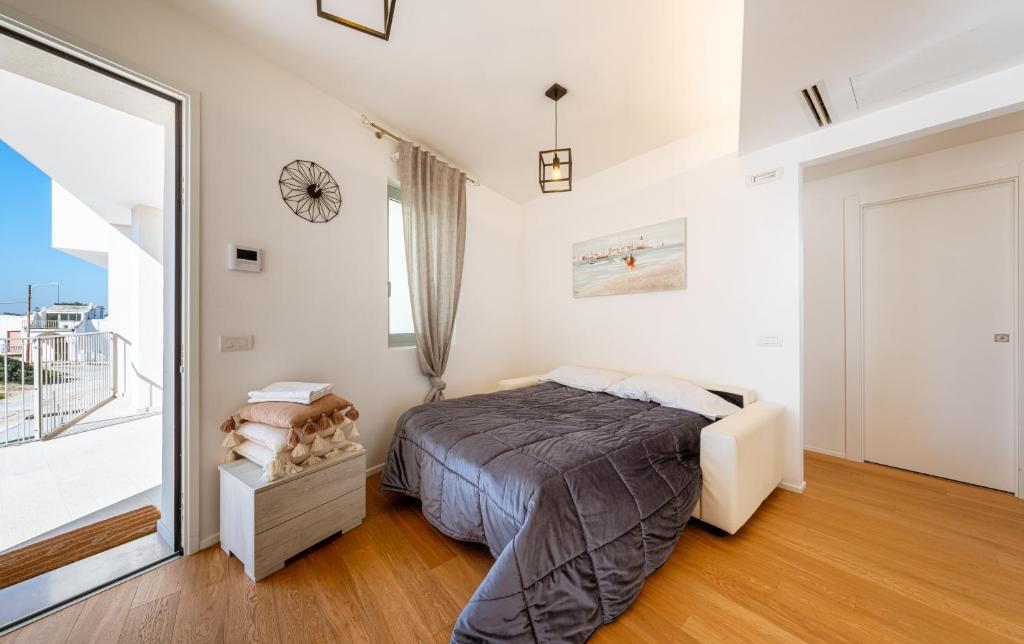 Postel nebo postele na pokoji v ubytování Vista Mare Polignano